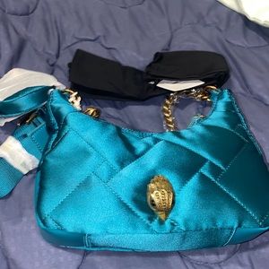 Kurt Geiger recycled bag in the color aqua/teal